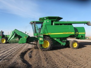 JD9550combine 300x225 Record High Auction Prices in Canada