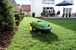 The new Tango E5 mower is on display at the John Deere Pavilion, giving U.S. Deere fans an opportunity to see its capabilities in action