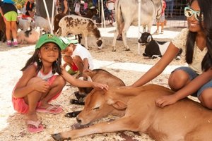 John Deere's annual Learn & Play Day offered children a number of hands-on activities to participate in, including a petting zoo. 