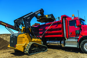 Loading dump trucks with material is made easy thanks to the new vertical-lift loader boom design on the large-frame G-Series skid steers.