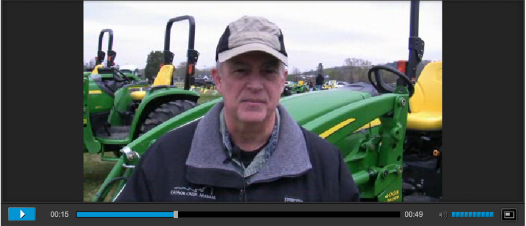 Earl test driving a John Deere