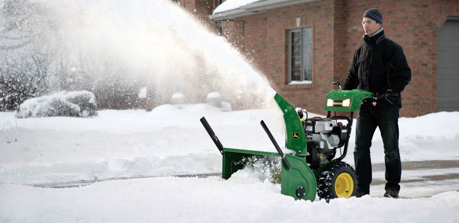 winter snow removal with JD snow blower