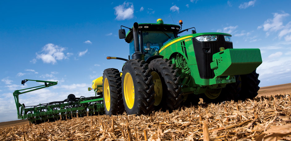 john deere tractors in field