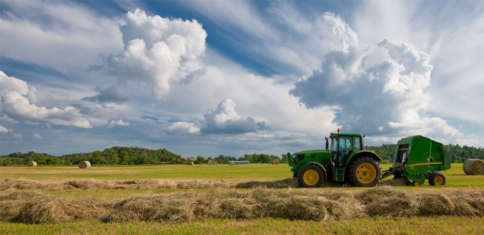 JD baler tractor baling hay