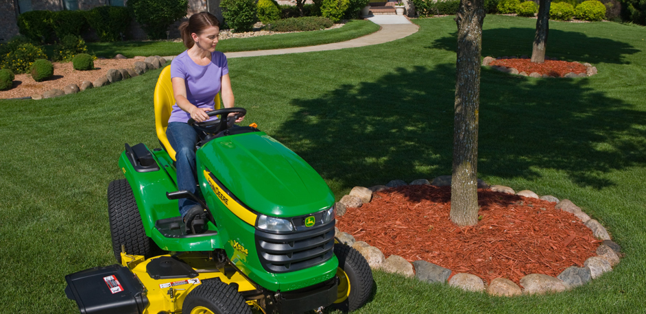John Deere lawn tractor mowing 
