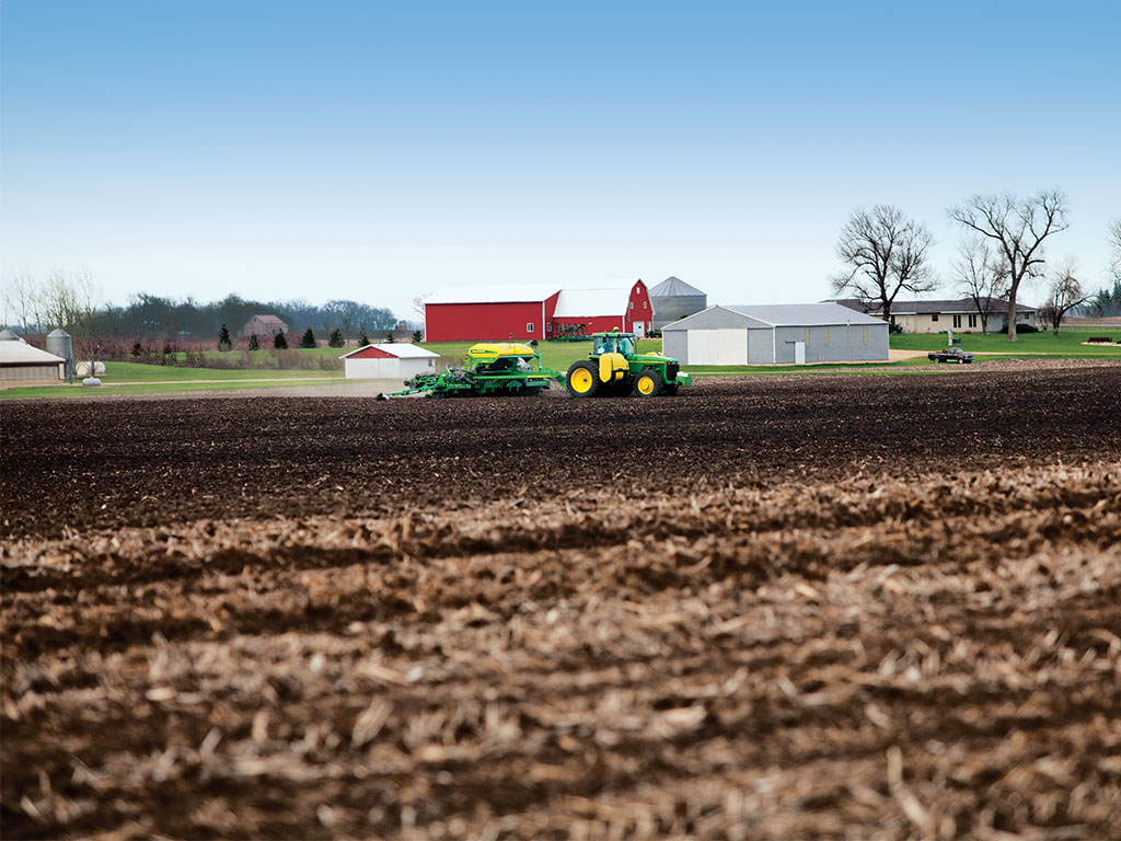 Tractor Planting in Field 