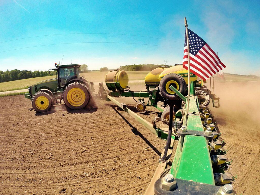 John Deere planter with USA flag 