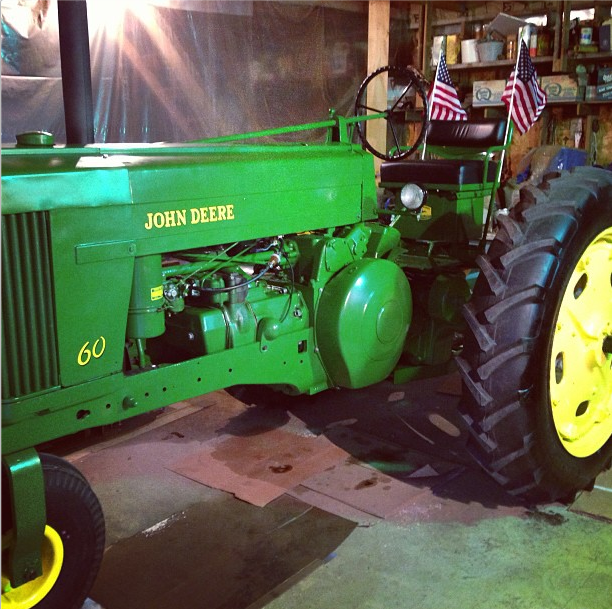 John Deere tractor in garage