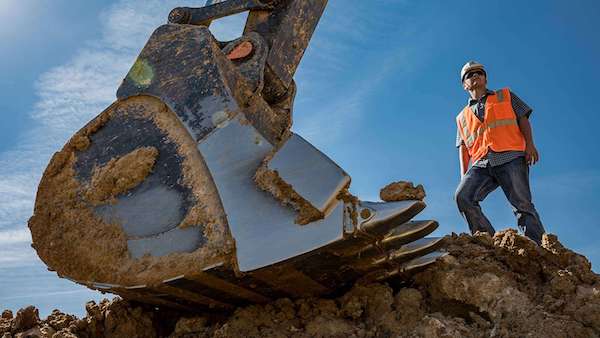 <img src="MiCa Enterprises.jpg" alt="Man standing next to excavator bucket"> 