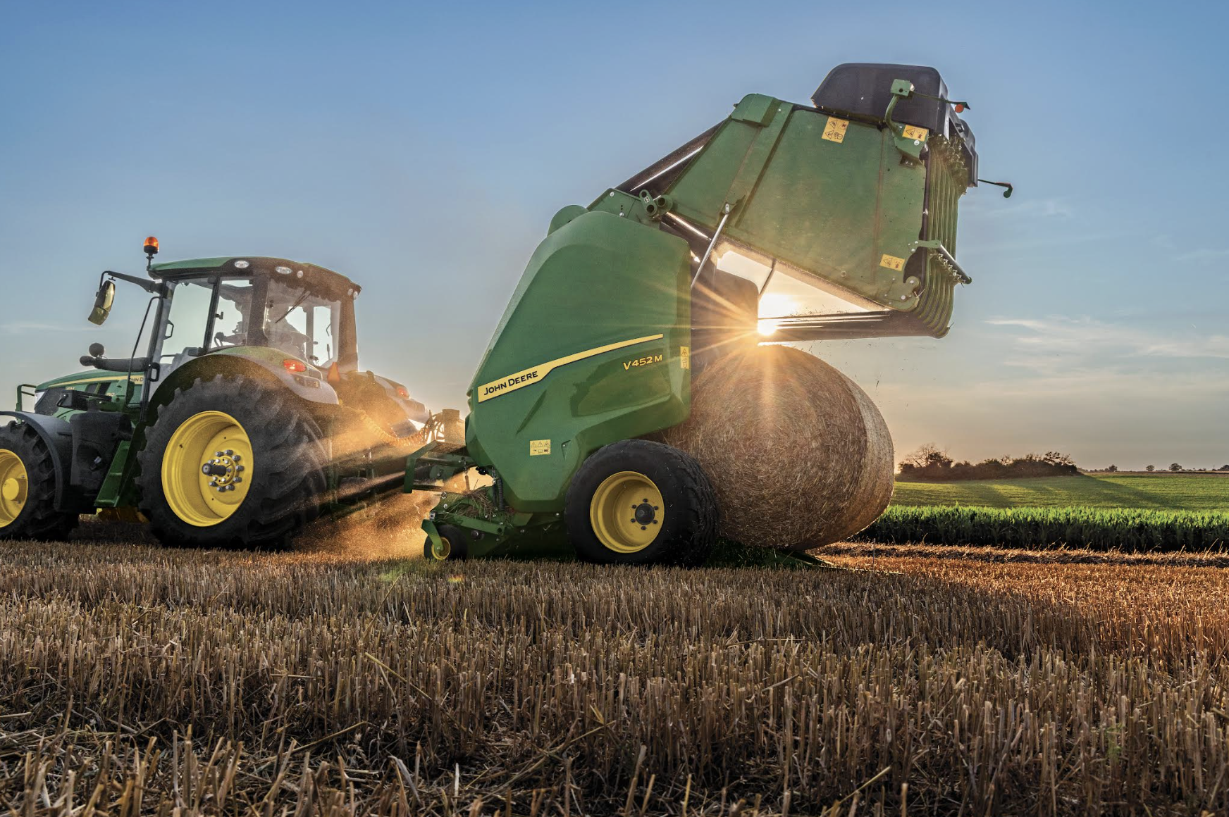 Built by John Deere, the V452M Round Baler adapts easily to uneven windrows and heavy crops while producing uniform bales that protect the value of every harvest.