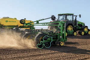 A John Deere planter equipped with ExactShot™ applies precise, per-seed fertilizer dosing to cut input costs and reduce refill stops.