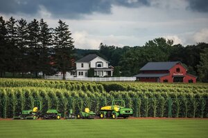 John Deere equipment on the Field of Dreams baseball field in Dyersville, Iowa, site of the 2026 MLB at Field of Dreams Game presented by John Deere.