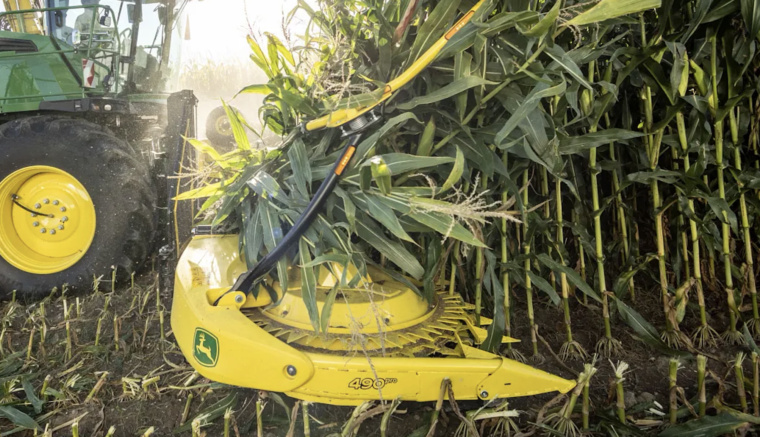 Rotary Crop Header - 490Pro harvesting standing corn in a field.